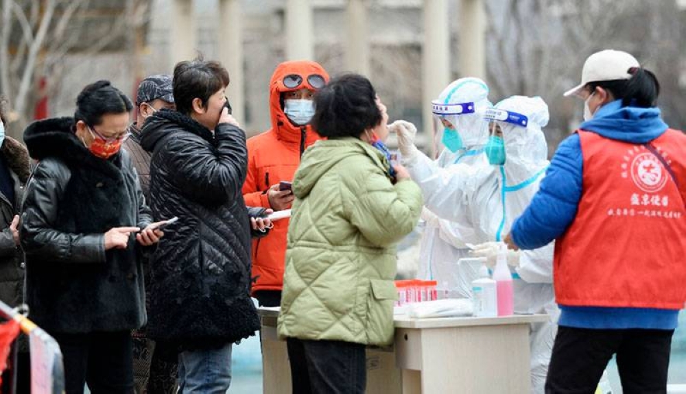 Brigadas de monitoreo de casos de covid-19 en Shanghai, China.AFP