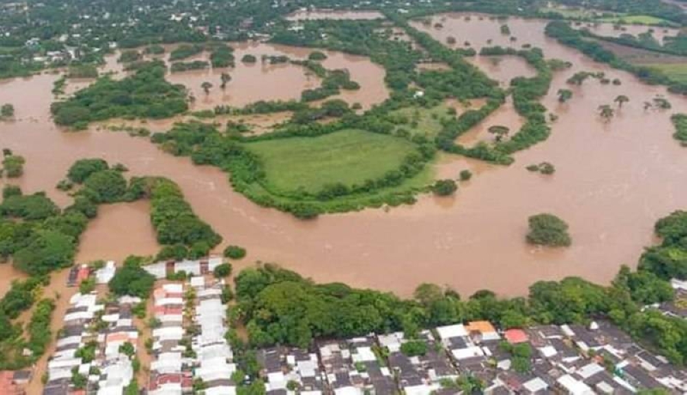 Desbordado río Grande de San Miguel obliga numerosas evacuaciones.Cortesía SDP.