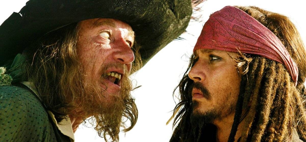 Johnny Depp as Jack Sparrow (right) and Geoffrey Rush as Hector Barbossa in Pirates of the Caribbean: At World's End.  Disney movie.