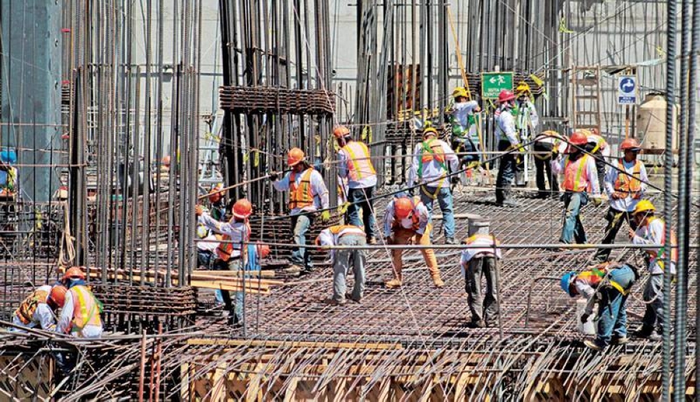 La industria de la construcción representa un 13  del PIB salvadoreño. /DEM,image_description: