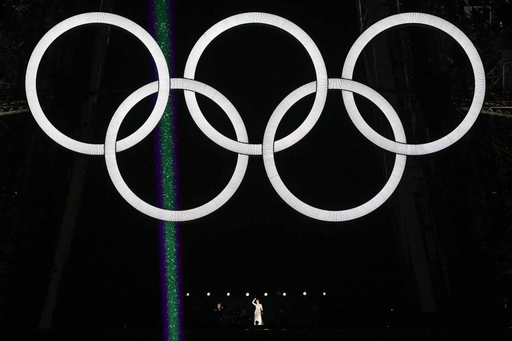 La cantante canadiense Celine Dion actúa en la Torre Eiffel durante la ceremonia de apertura de los Juegos Olímpicos de París 2024 en París el 26 de julio de 2024. (Foto de Loic VENANCE / POOL / AFP)