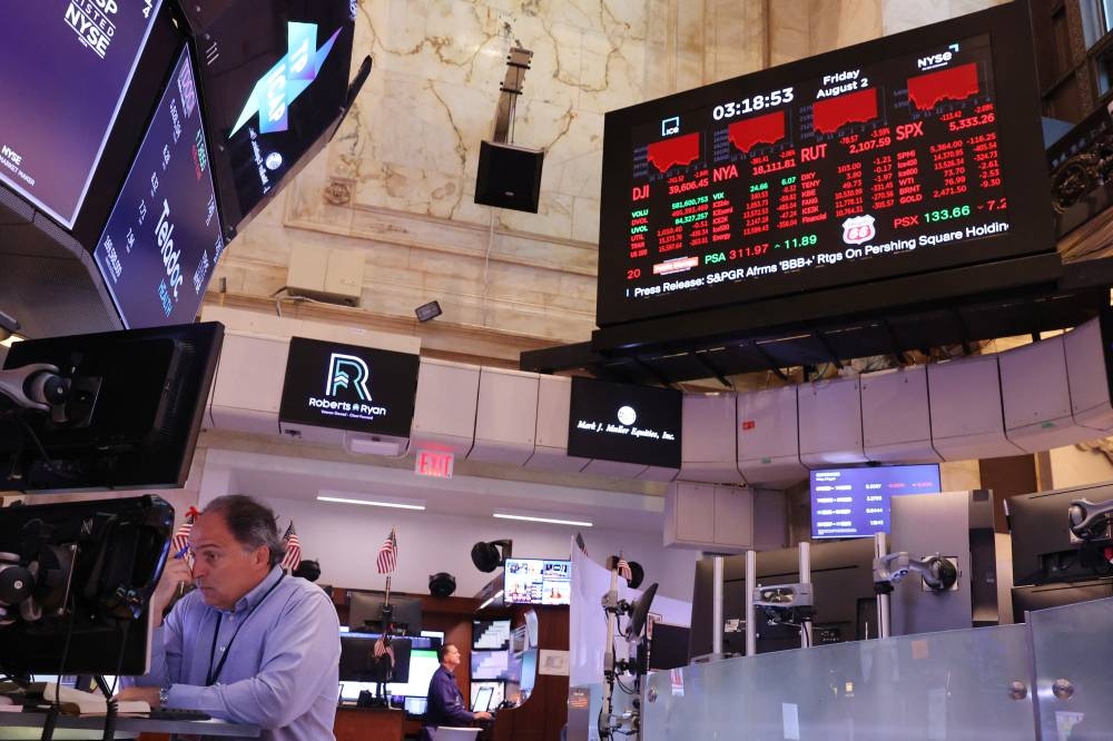 El mercado bursátil mundial reaccionó con fuertes caídas ante el temor de una recesión económica en EE. UU. /AFP,image_description:Markets Continue To Drop Sharply On Recent Economic Reports