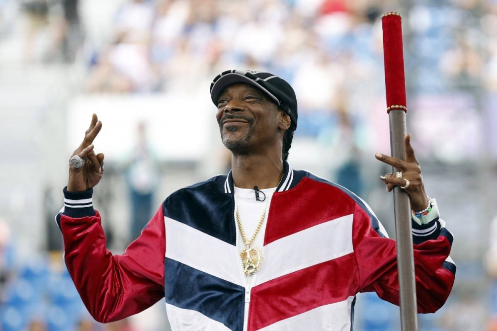 Snoop Dogg gives también se presentó en en el evento de danza Women039s Breaking durante París 2024 el pasado viernes. Photo by Odd ANDERSEN / AFP,image_description: