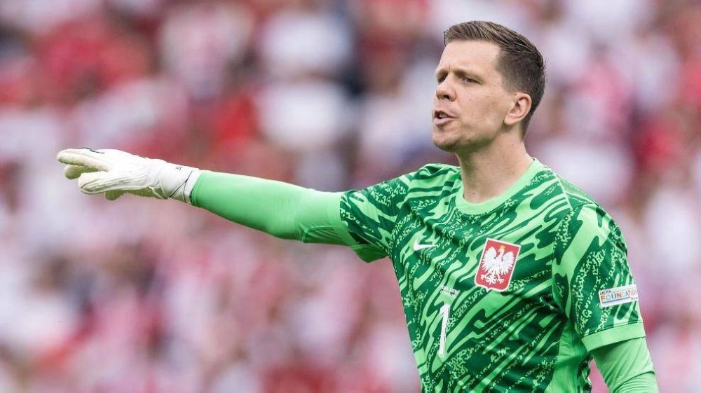 Wojciech Szczesny, portero internacional polaco.,image_description: