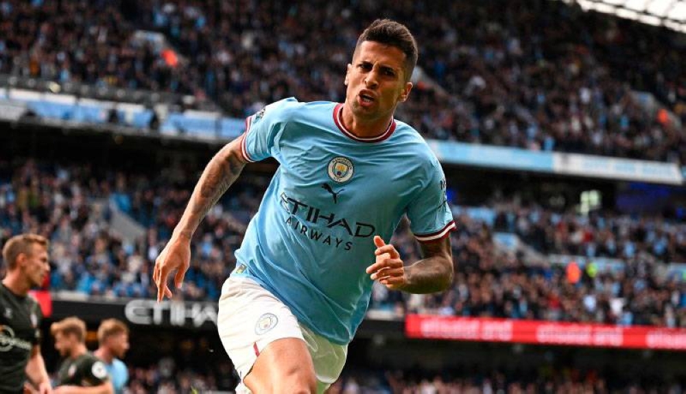 Joao Cancelo. / AFP,image_description: