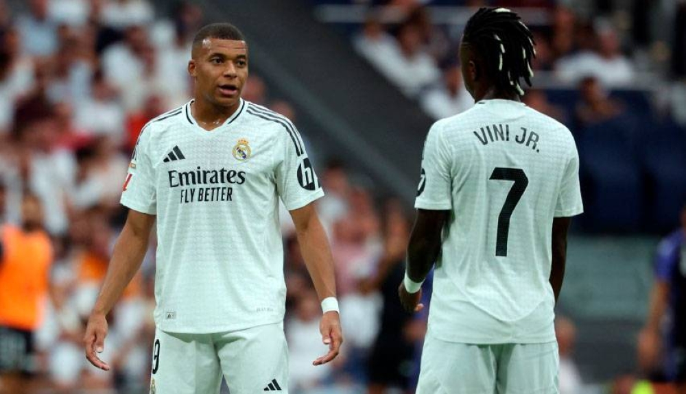 Kylian Mbappé y Vinicius Jr. las máximas estrellas del Real Madrid. / AFP,image_description: