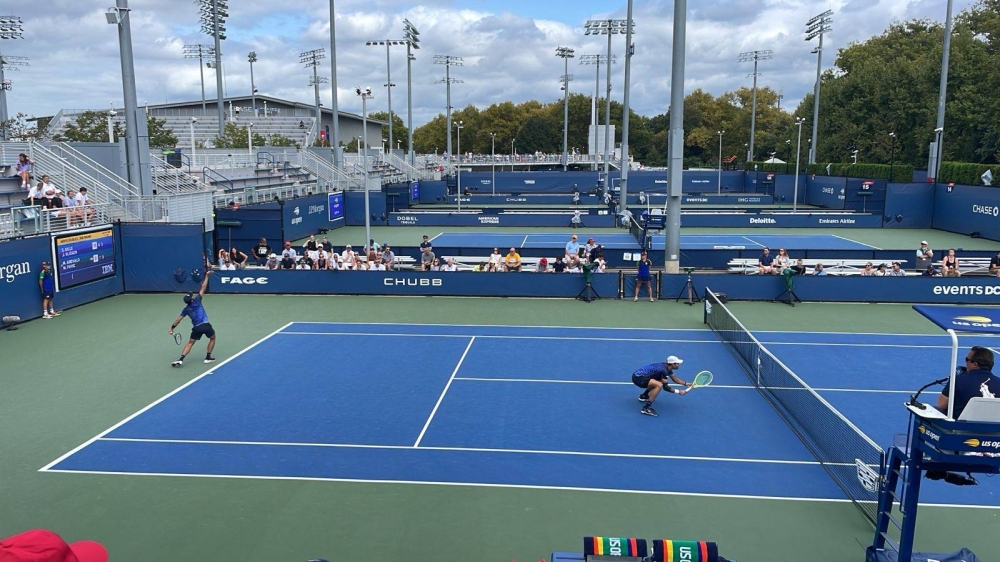 Una escena del juego de ArévaloPavic en la cancha 13 del US Open. / Jan Wuelfers,image_description: