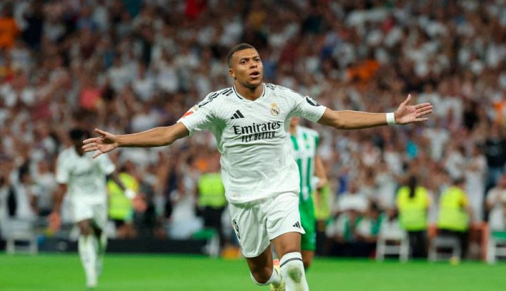 Kylian Mbappé anotó los dos goles de la victoria del Real Madrid sobre el Betis. / AFP ,image_description: