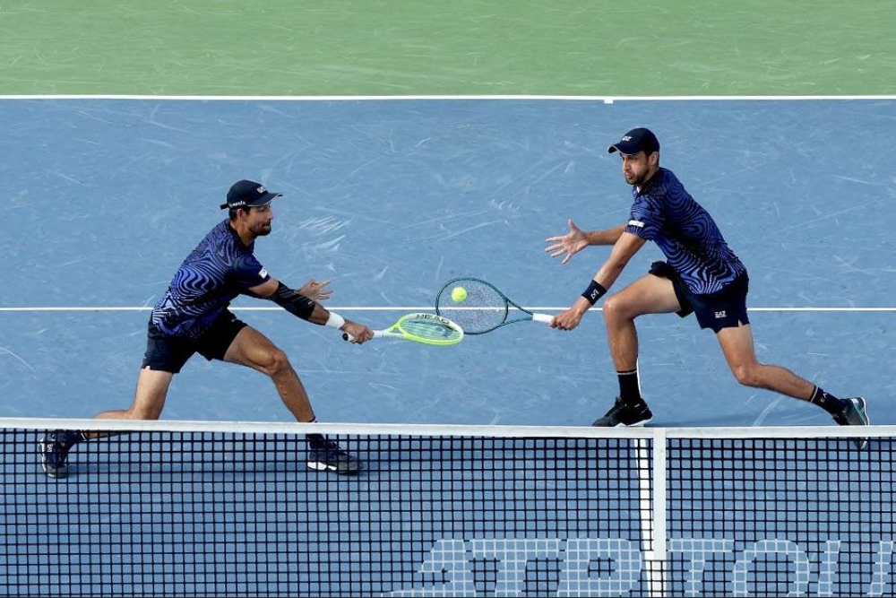 Arévalo y Pavic siguen en buena racha. ,image_description: