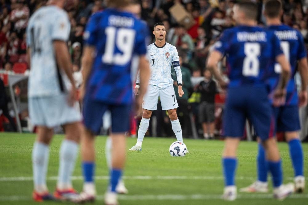 Cristiano Ronaldo anotó ante Croacia en la victoria 21 de Portugal. / AFP,image_description: