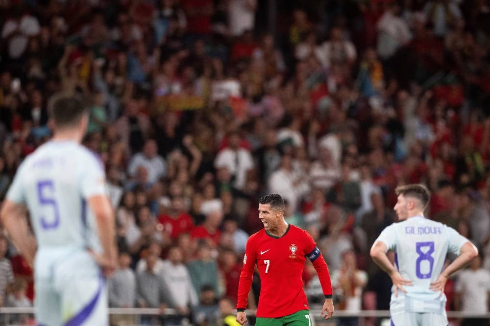 Cristiano Ronaldo entró en el segundo tiempo y sobre el final le anotó a Escocia. / AFP,image_description: