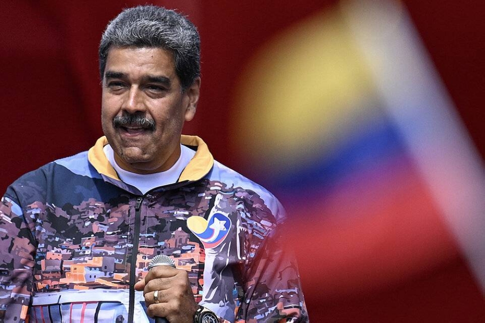 El avión fue visto cuando el mandatario  venezolano viajó a San Vicente y las Granadinas en diciembre de 2023, para asistir a un encuentro por el diferendo fronterizo con Guyana. / AFP,image_description: