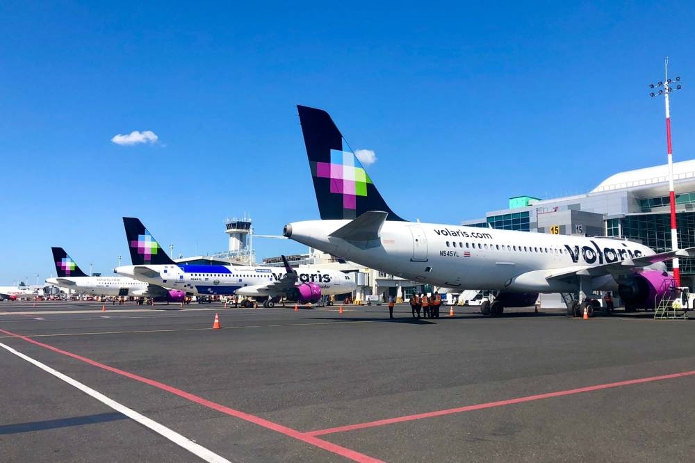 Volaris El Salvador es la segunda aerolínea con mayor operación, con 16  de participación en 2023. /Volaris,image_description: