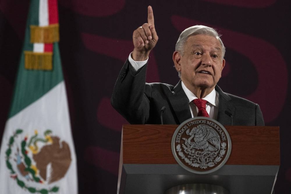 El presidente mexicano Andrés Manuel López Obrador en una de sus conferencias matutinas llamada La Mañanera. Yuri CORTEZ / AFP,image_description: