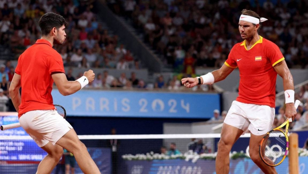 Carlos Alcaraz y Rafael Nadal en los Juegos Olímpicos París 2024. ,image_description: