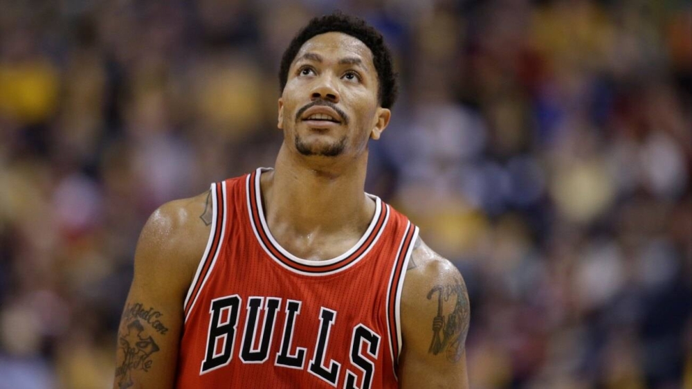 Chicago Bulls Derrick Rose 1 in action during the second half of an NBA basketball game against the Indiana Pacers Monday, Dec. 29, 2014, in Indianapolis. Chicago defeated Indiana 9290. AP Photo/Darron Cummings,image_description:Derrick Rose