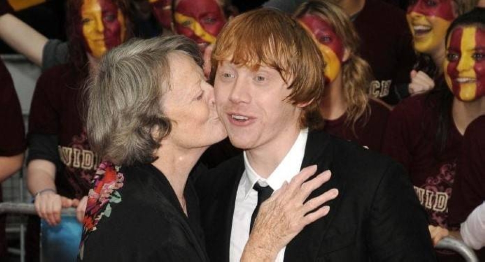 Rupert recordó a Maggie con este cariñoso e inolvidable beso en una de las alfombras rojas de Potter.,image_description: