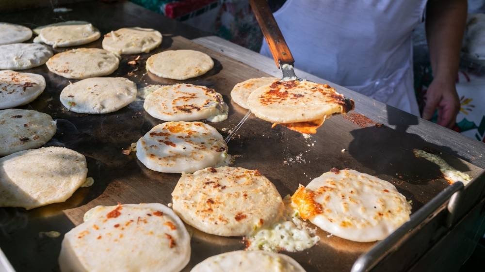 Si deseas probar esta nueva variedad de pupusas con fresas del lugar, no puedes perderte el festival el próximo noviembre. ,image_description: