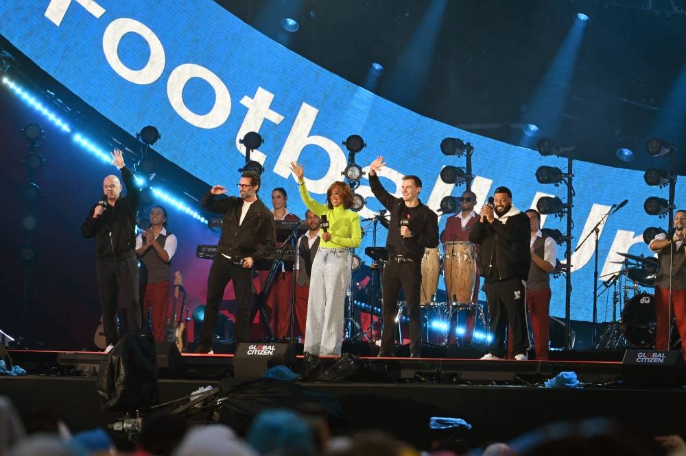 Gianni Infantino, Hugh Jackman, Gayle King, Hugh Evans y DJ Khaled hablan en el escenario durante el Global Citizen Festival 2024 en Central Park el 28 de septiembre de 2024 en la ciudad de Nueva York. Noam Galai/AFP,image_description:Global Citizen Festival 2024