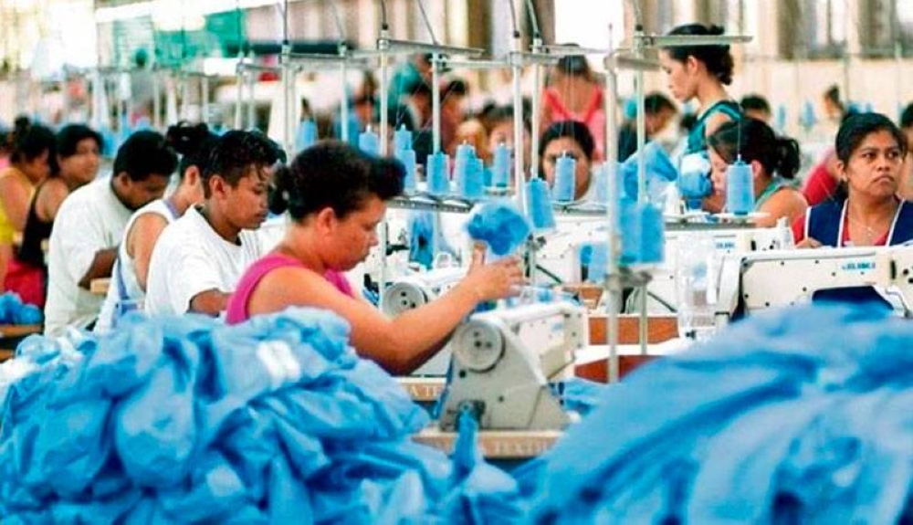 El sector textil y de zonas francas es uno de los grandes empleadores de El Salvador. /DEM,image_description: