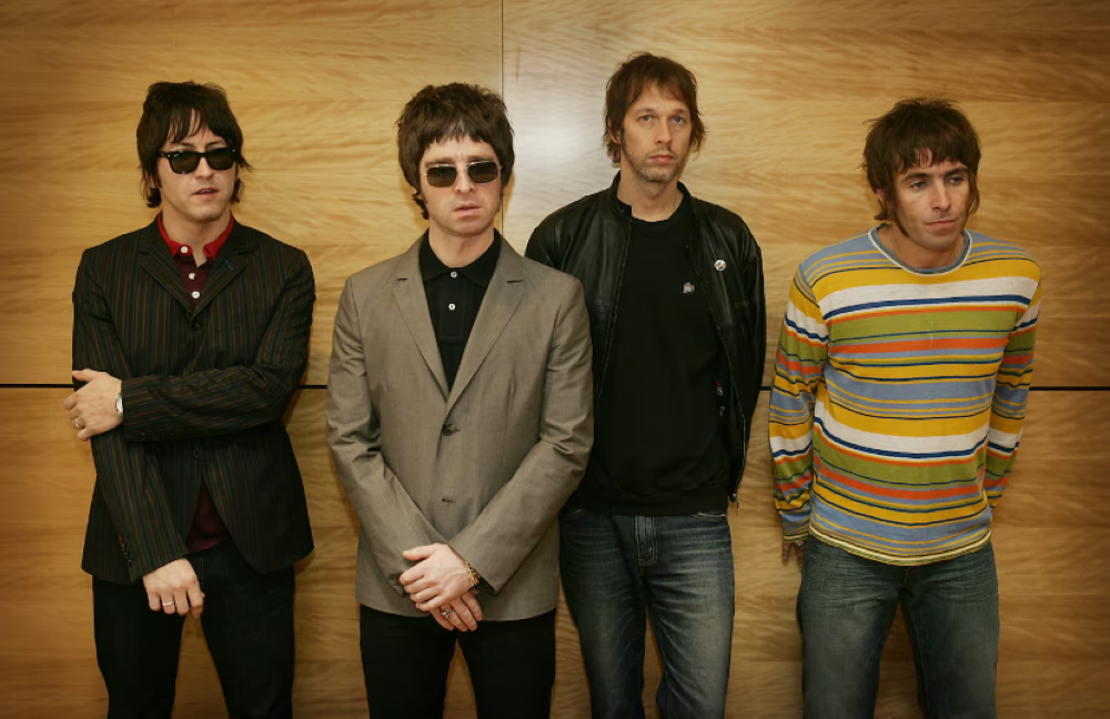 La banda Oasis anunció a fines de agosto que se volverían a juntar para una gira de regreso, 15 años después de su separación.,image_description: