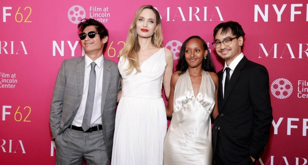 Pax Thien JoliePitt, Angelina Jolie, Zahara Marley Jolie y Maddox Chivan JoliePitt. Photo by Jason Mendez / GETTY IMAGES NORTH AMERICA / Getty Images via AFP,image_description: