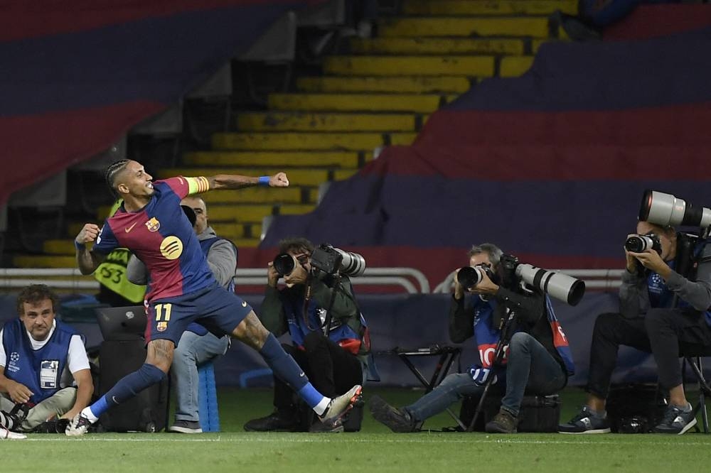 Raphinha celebra su gol contra Young Boys. / AFP,image_description: