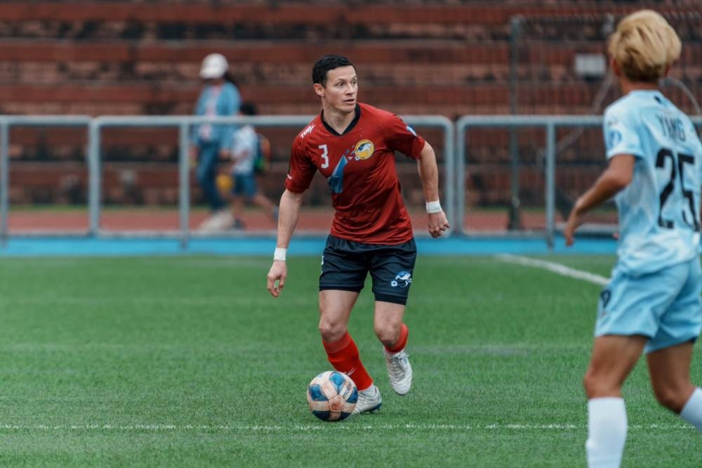 William López jugando para su equipo en Taiwán. ,image_description: