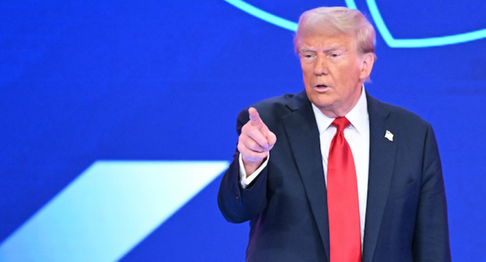 El expresidente y candidato republicano Donald Trump, durante un discurso en Miami Florida el miércoles 16 de octubre./AFP,image_description: