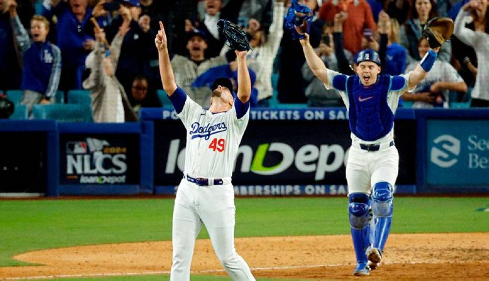 Lis Ángeles Dodgers se verán las caras en la Serie Mundial ante los Yankees. / AFP,image_description: