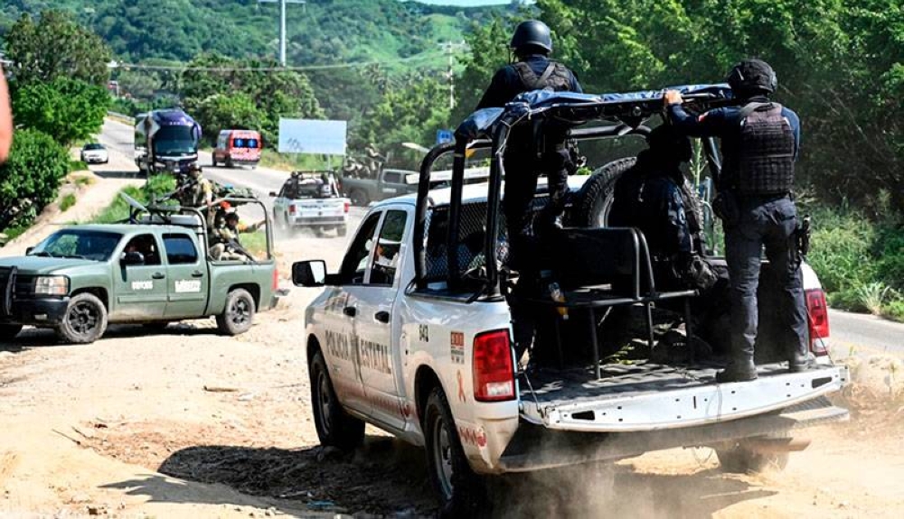 Al menos 14 delincuentes murieron en el enfrentamiento. / AFP,image_description: