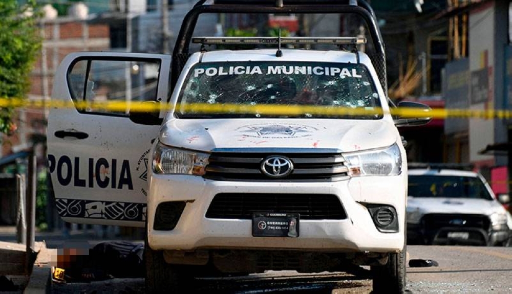 Policías municipales, civiles e integrantes de las bandas delictivas han muerto en los últimos días. / AFP,image_description: