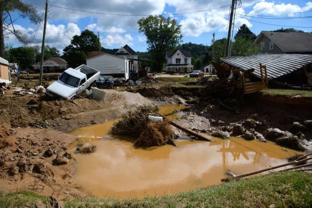 Daños causados por las inundaciones en Mill Creek tras el paso del huracán Helene el domingo 29 de septiembre en Old Fort, Carolina del Norte. / AFP,image_description:Storm Helene Causes Massive Flooding Across Swath Of Western North Carolina