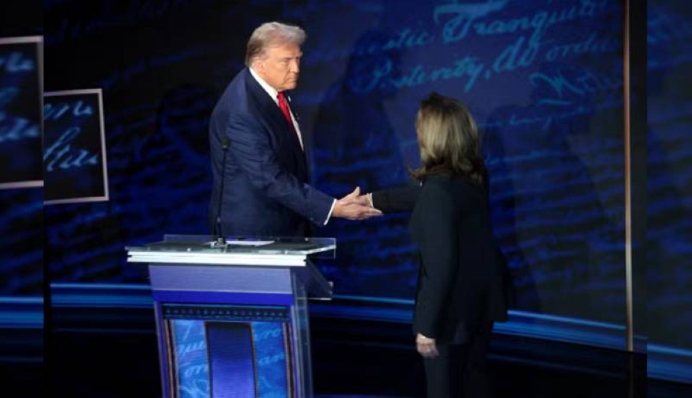 u00bfY si hay un empate entre los candidatos Donald Trump y Kamala Harris / Foto AFP.,image_description: