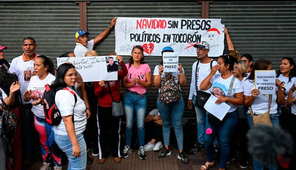 Familiares de los detenidos exigen su libertad. / AFP,image_description: