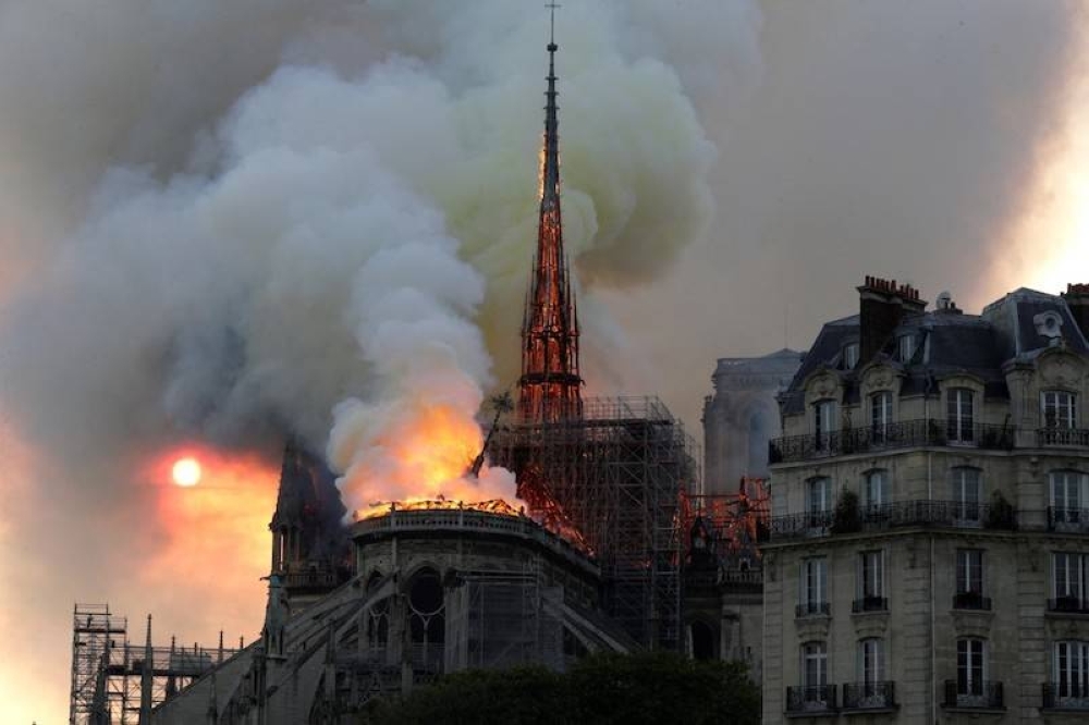 La Catedral de NotreDame en llamas, el 15 de abril de 2019. / AFP.,image_description: