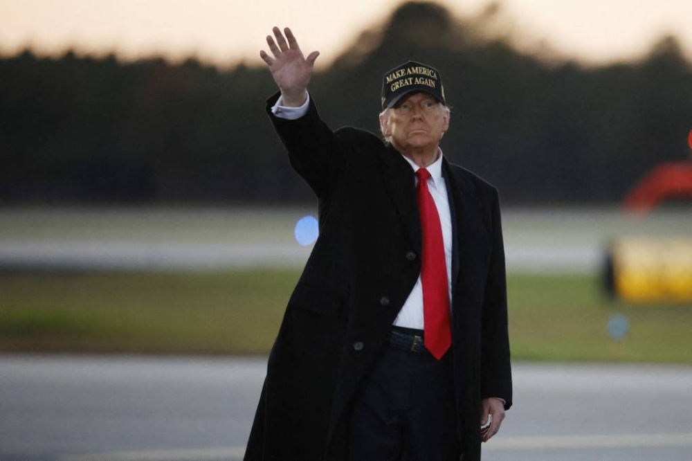 Donald Trump, en su campaña, en Carolina del Norte. / AFP.,image_description: