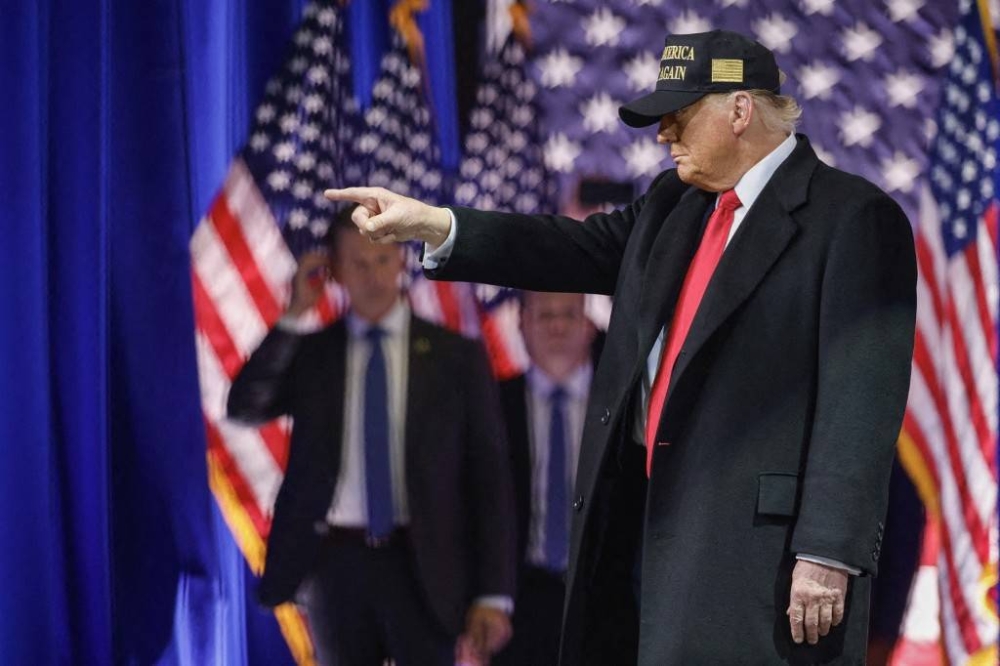 Donald Trump durante su campaña en el anfiteatro Atrium Health en Macon, Georgia. / AFP.,image_description: