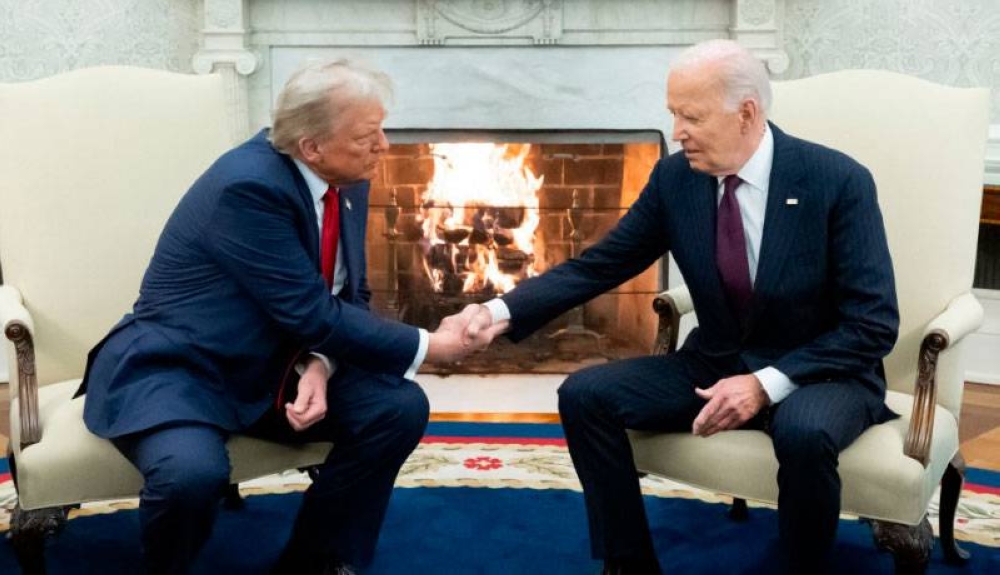 Biden se encontró por primera vez con su sucesor. / AFP ,image_description: