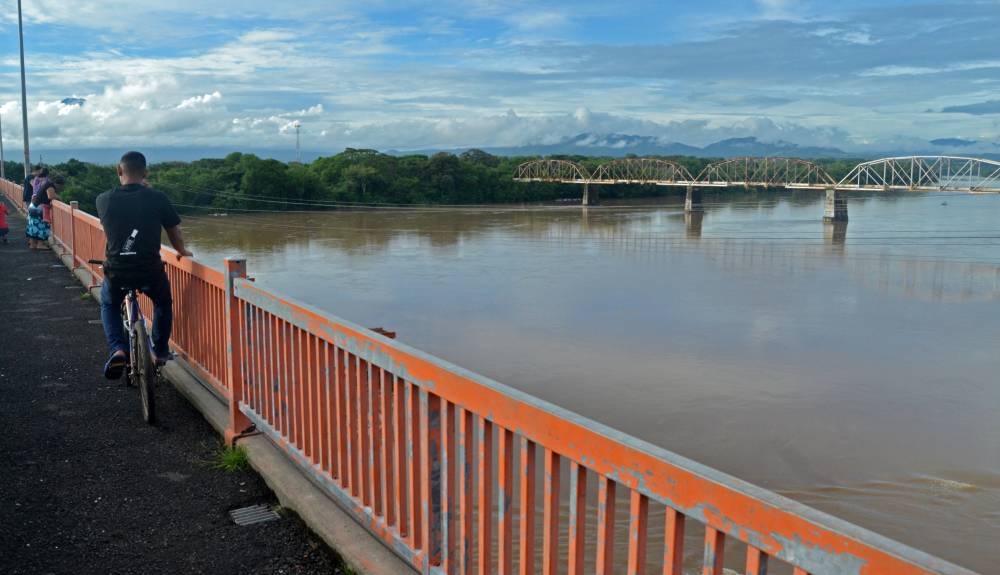 Los ahorros que se deriven del pago de la deuda se destinarán para intervenir el río Lempa. /DEM,image_description: