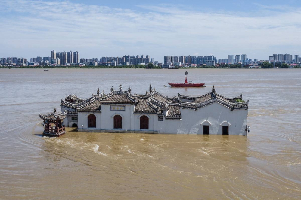 El año 2024 fue el más cálido registrado en China, según informó su agencia meteorológica, mientras el mundo enfrenta un aumento de fenómenos meteorológicos extremos impulsados por el cambio climático/ Foto AFP.,image_description: