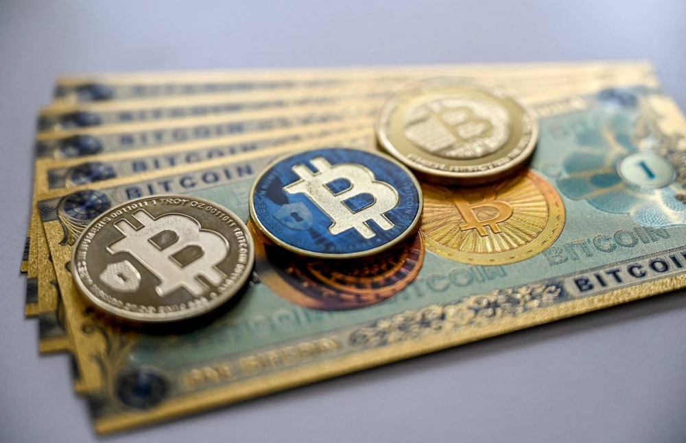 Imagen de carácter ilustrativa de bitcoin/ Foto Ozán Kose AFP.,image_description: