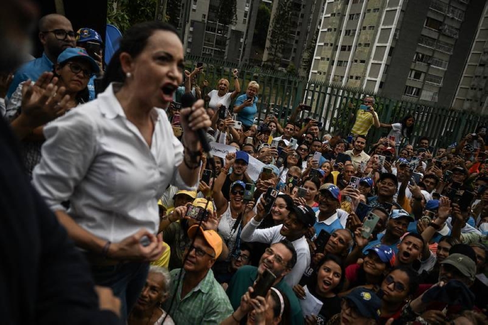 María Corina Machado convocó una nueva movilización para protestar contra el fraude electoral en Venezuela. / AFP.,image_description: