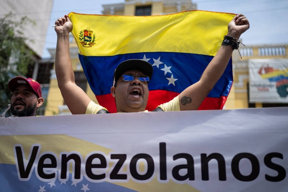 Para beneficiarse de esta medida son elegibles aquellos venezolanos que hayan residido de forma continuada en Estados Unidos al menos desde finales de julio de 2023. /AFP,image_description: