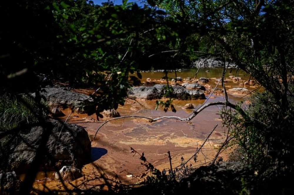 Vista del río San Sebastián, contaminado por la actividad minera, en Santa Rosa de Lima, La Unión, El Salvador, el 5 de diciembre de 2024. / Daniela Rodríguez-AFP.