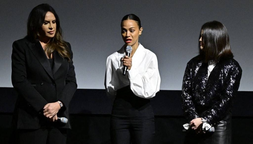 Karla Sofía Gascón, Zou00eb Saldaña y Selena Gómez en una presentación de Emilia Perez en Nueva York, el pasado 3 de diciembre. Photo by Eugene Gologursky / GETTY IMAGES NORTH AMERICA / Getty Images via AFP,image_description: