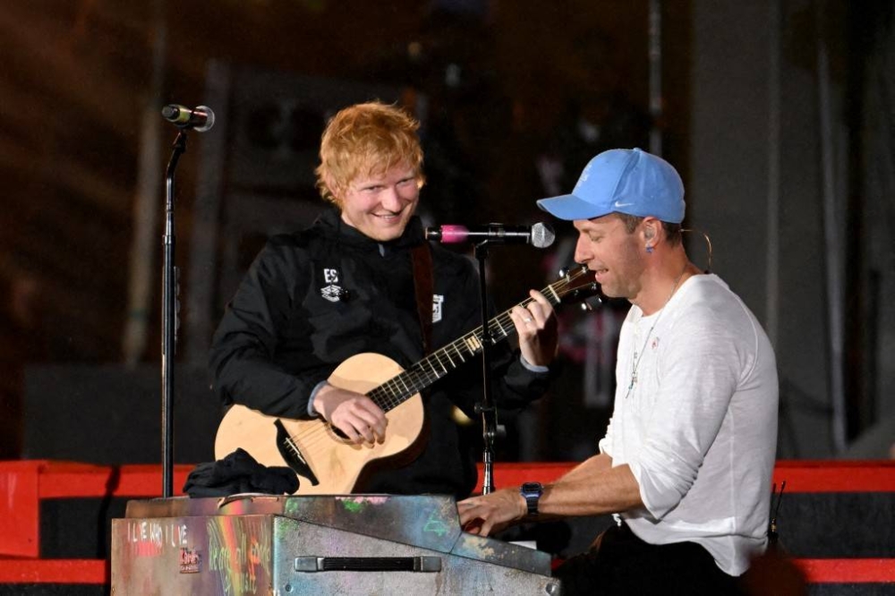 Ed Sheeran izq. está actualmente de gira en seis ciudades indias, con algunos de los conciertos completos. Photo by Noam Galai / GETTY IMAGES NORTH AMERICA / Getty Images via AFP,image_description:Global Citizen Festival 2024